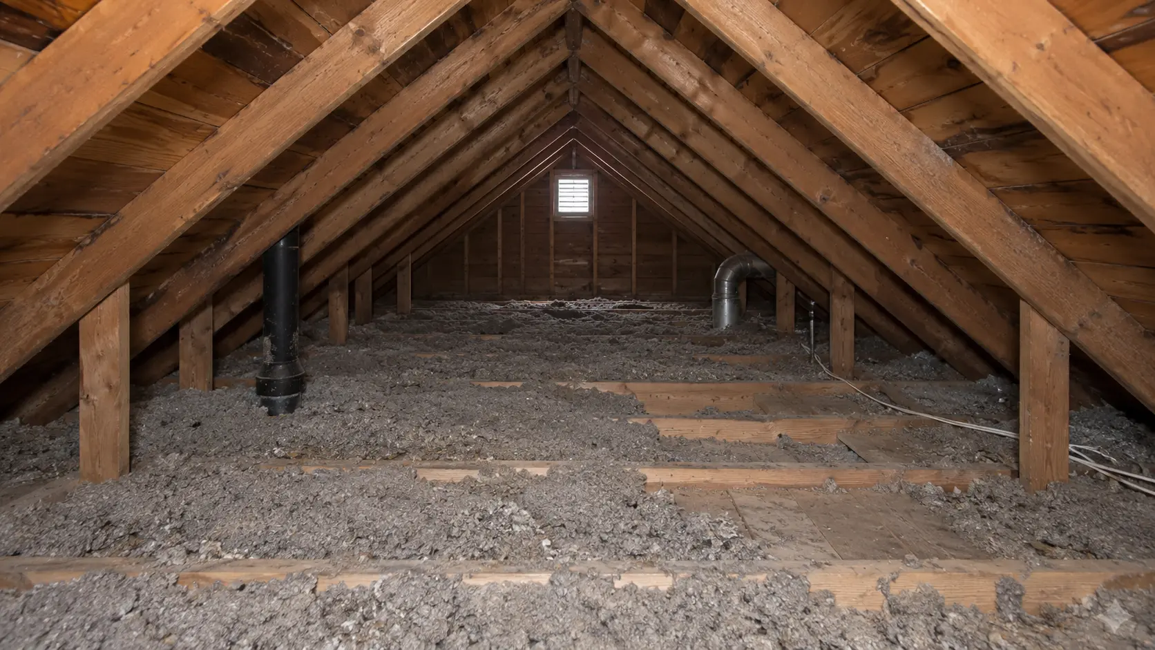 Attic before a bluejack cellulose insulation upgrade